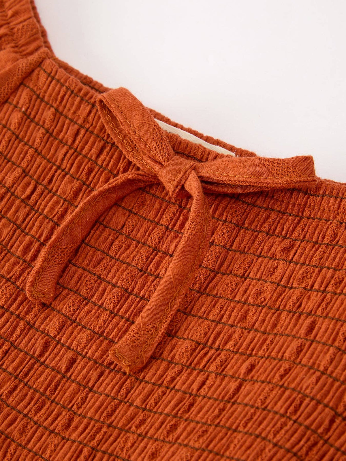 Rust Smocked Ruffle Dress