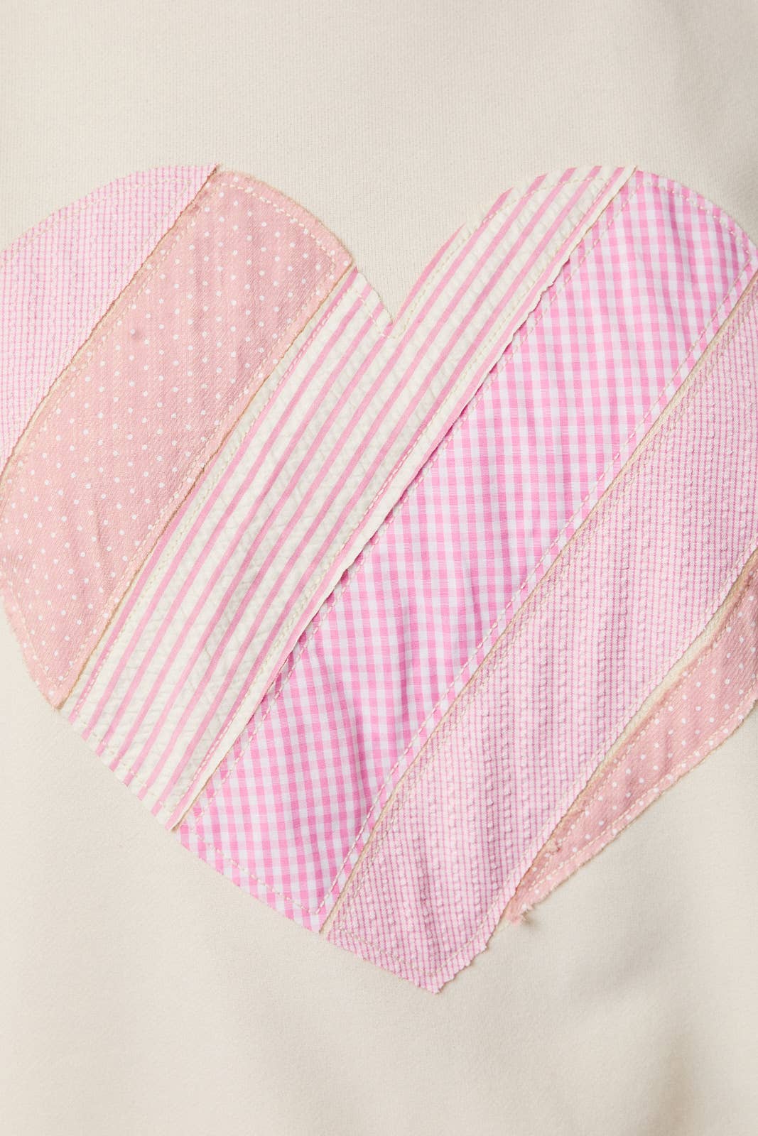 HEART PATCHWORK SWEATSHIRT