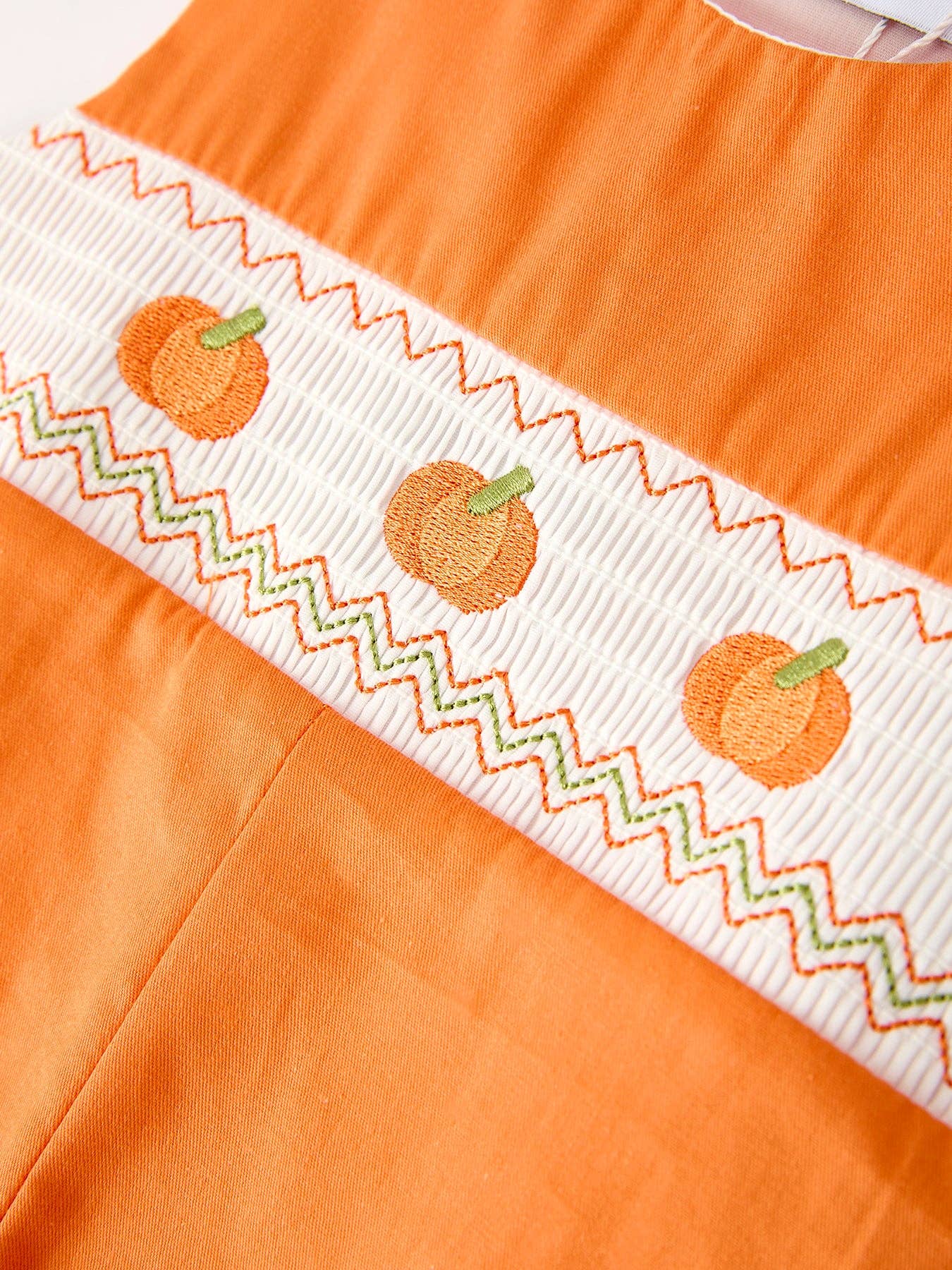 Orange Pumpkin Smocked Romper