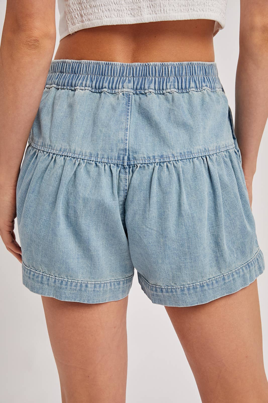 PLEATED DENIM SHORTS